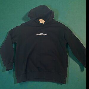 Maison margiela reverse logo hoodie size 44 (between a small and medium)